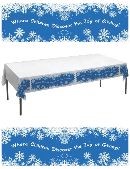 Decorative tablecloth with the phrase - Where Children Discover the Joy of Giving!
